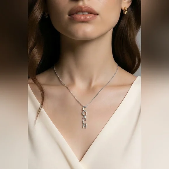 Coa ch Silver-Tone Vertical Logo Pendant Necklace - Picture 5 of 7